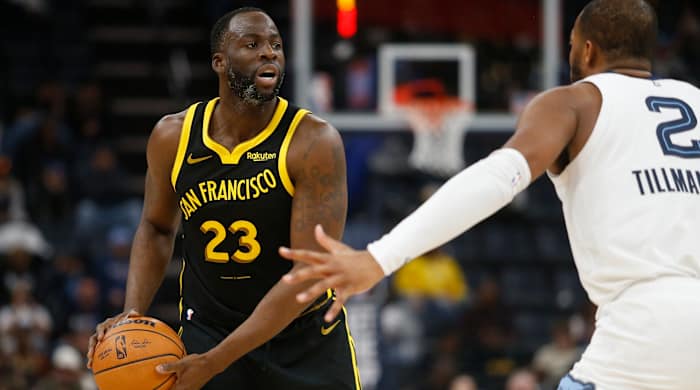 Golden State Warriors forward Draymond Green handles the ball against the Memphis Grizzlies.
